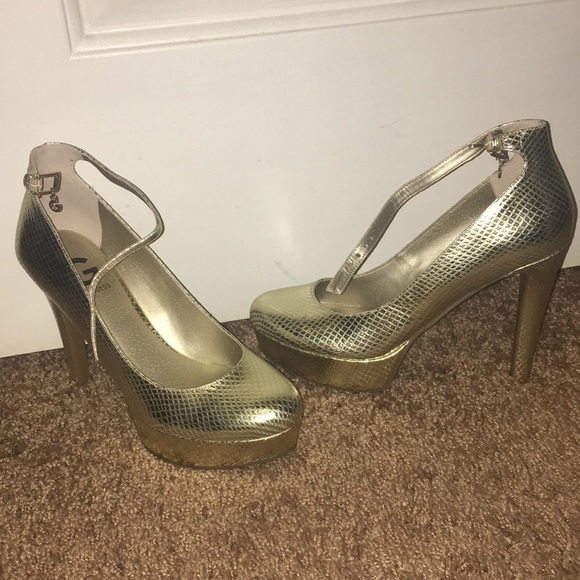 Guess Shoes - Guess gold platform heels